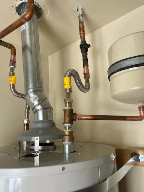 Water heater installation and plumbing repair in Mustang Pointe Aerodrome Condominiums